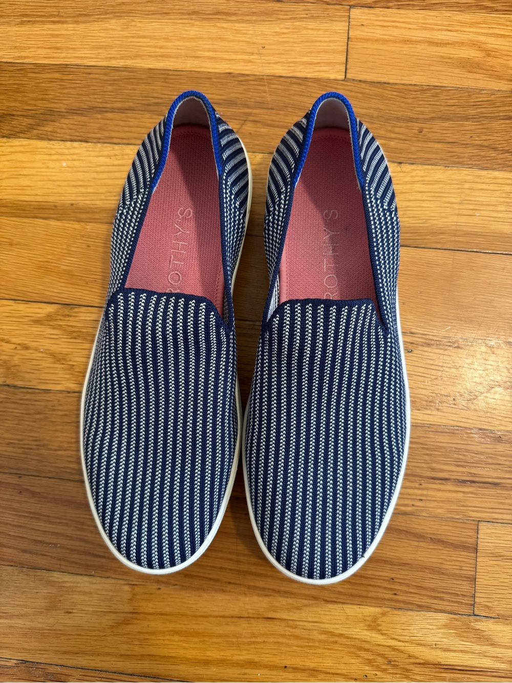 Rothy’s the original slip on sneaker navy and white stripe- size 9.5